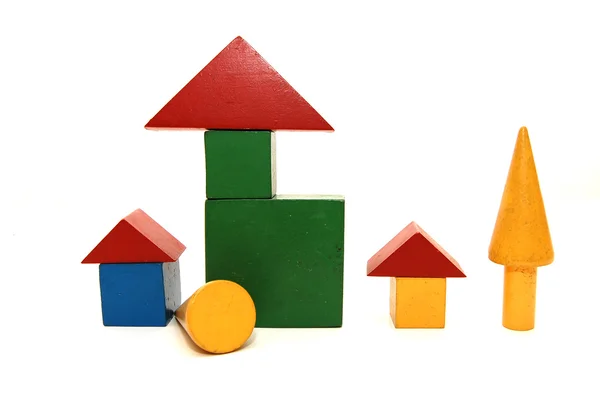 Building from wooden childrens blocks — Stock Photo, Image