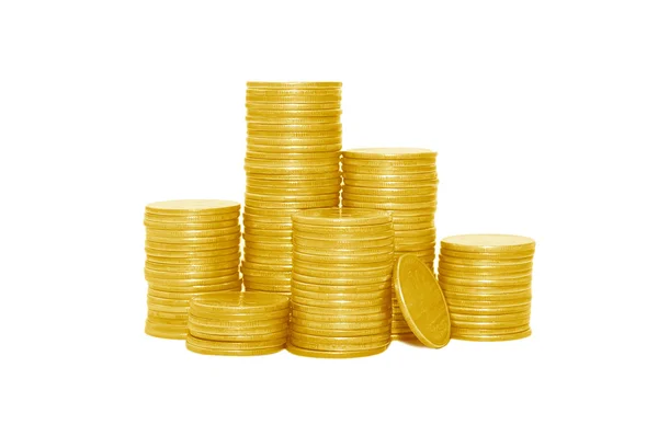 Золотые монеты на белом — стоковое фото