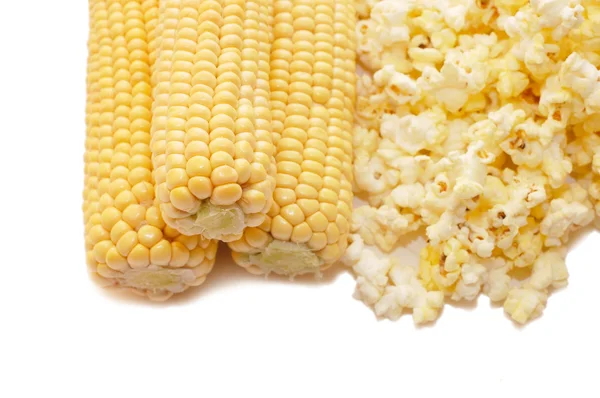 Very tasty fresh corn and popcorn — Stock Photo, Image