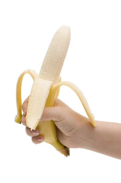 Banana in mano su sfondo bianco — Foto Stock
