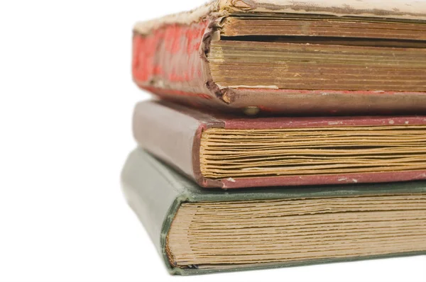 Högen med gamla böcker isolerade på vitt — Stockfoto
