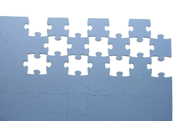 Segmenten van puzzel, geïsoleerd op witte achtergrond — Stockfoto