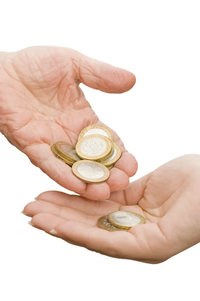 Coins from old hands in the young — Stock Photo, Image