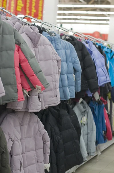 Winter jackets in a supermarket — Stock Photo, Image