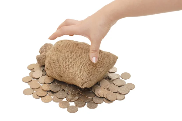 Hand reach for bags with coins — Stock Photo, Image