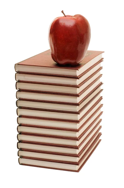Montón de libros y manzanas aisladas —  Fotos de Stock