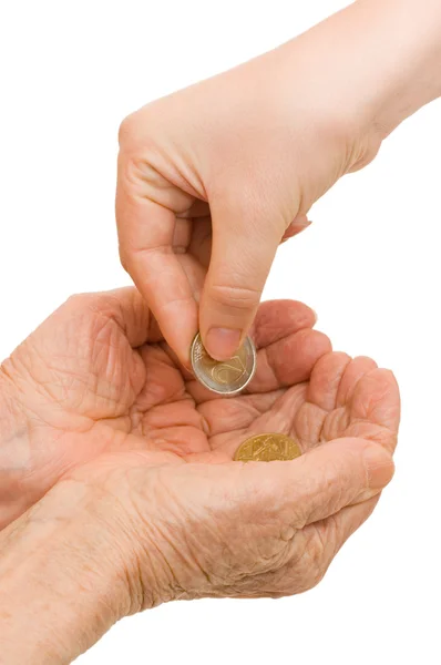 stock image Young and old hand with a coin