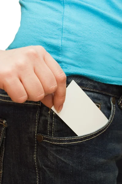 Girl in jeans holds a credit card — Stock Photo, Image