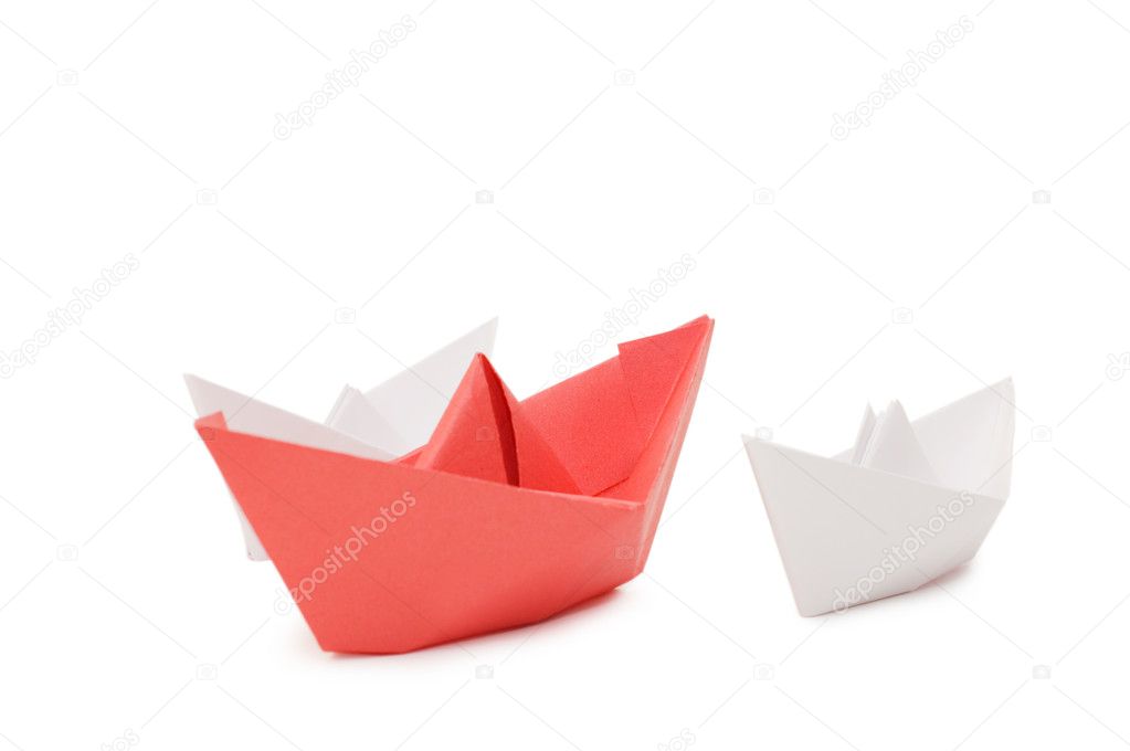 Paper ships isolated on white background