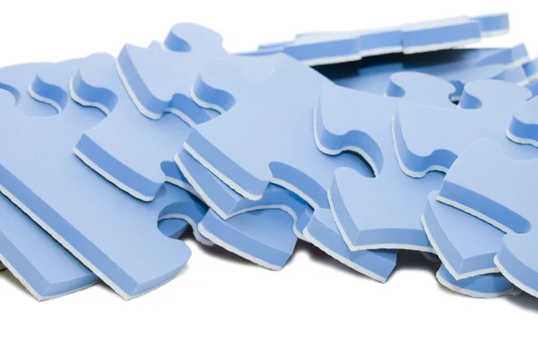 Slices of puzzle, isolated on white — Stock Photo, Image