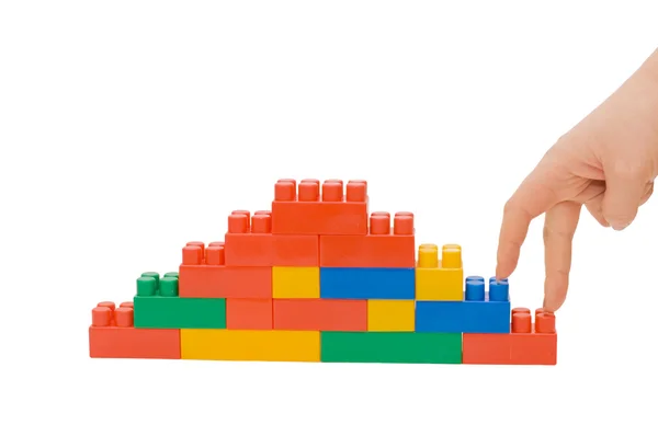 Hand och leksak trappor isolerade — Stockfoto