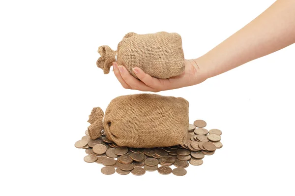 Bag with coins in a female hand — Stock Photo, Image