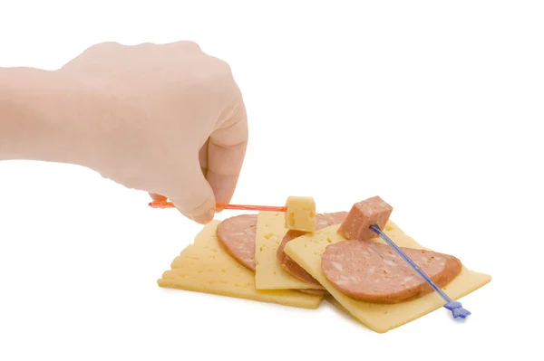 Ręka z plasterkiem sera — Zdjęcie stockowe