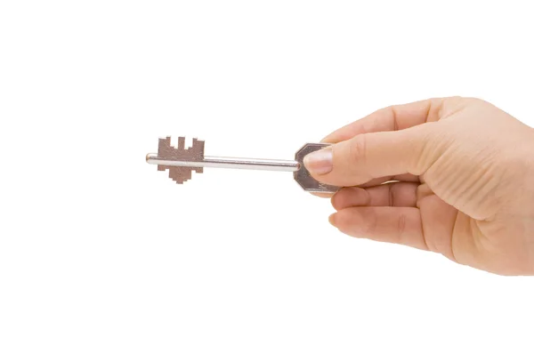 Schlüssel in einer Hand isoliert auf weiß — Stockfoto