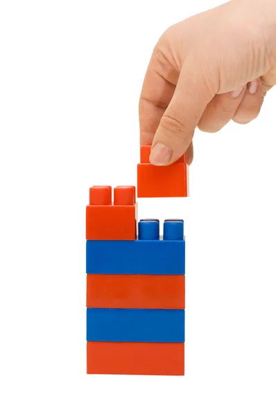 Torre di mano e giocattolo isolata — Foto Stock