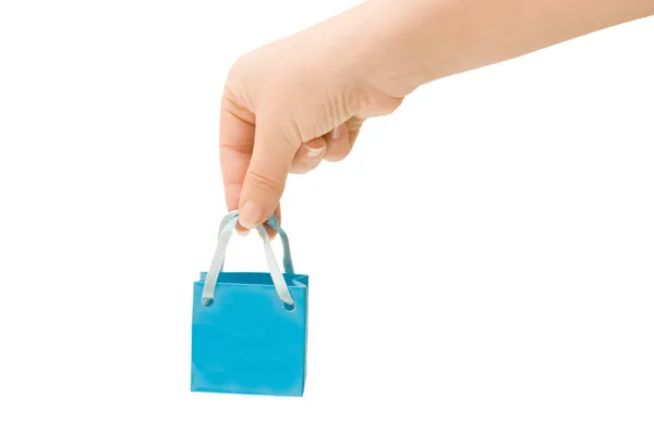 Donker blauwe zak in een vrouwelijke hand — Stockfoto