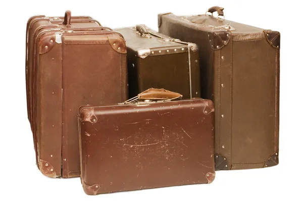 Montón de maletas viejas aisladas —  Fotos de Stock