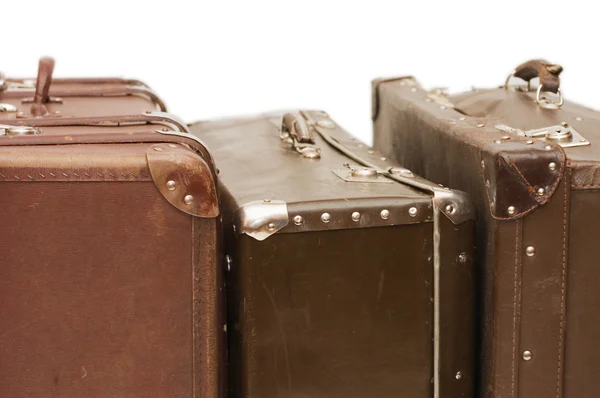 Montón de maletas viejas aisladas — Foto de Stock