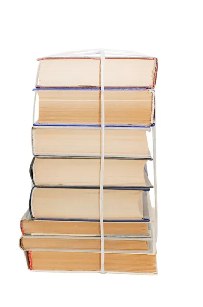 Högen med gamla böcker isolerade på vitt — Stockfoto