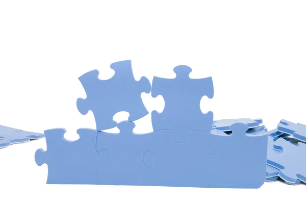 Segmenten van puzzel, geïsoleerd op wit — Stockfoto