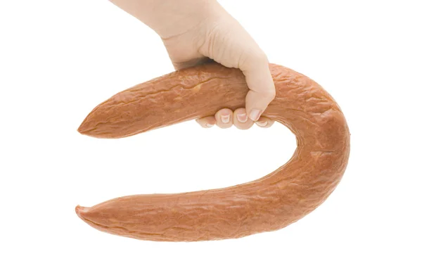 Salsiccia in una mano isolata — Foto Stock