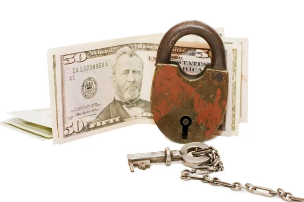 La serratura su soldi isolati su bianco — Foto Stock