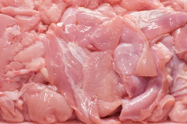 Cut fresh crude meat as a background — Stock Photo, Image