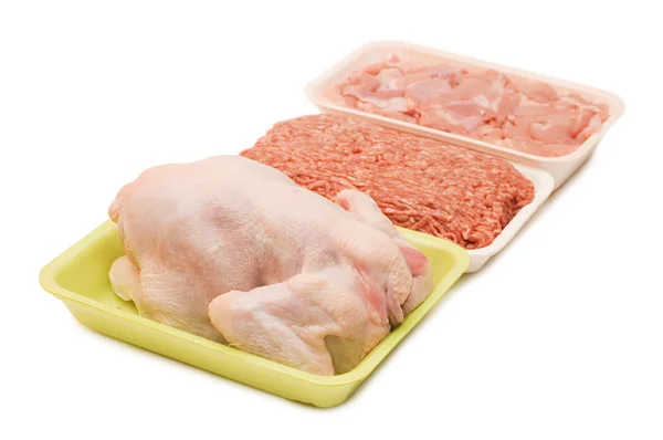 Assortment of crude meat in trays — Stock Photo, Image