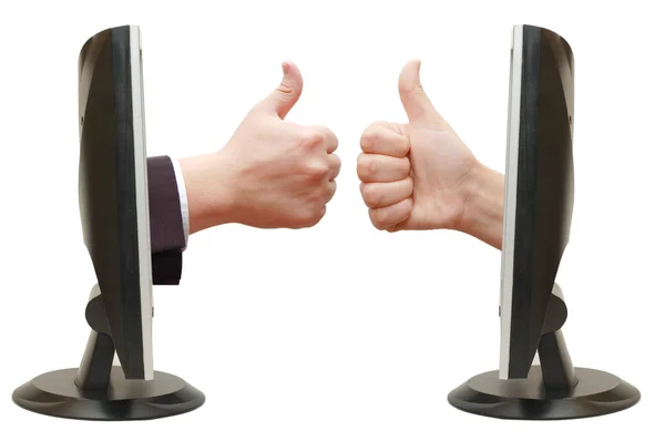 Thumbs up hand from the monitor — Stock Photo, Image