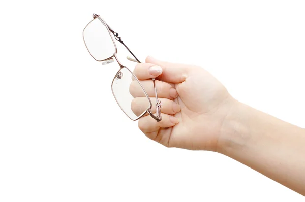 Óculos em uma mão feminina isolada — Fotografia de Stock
