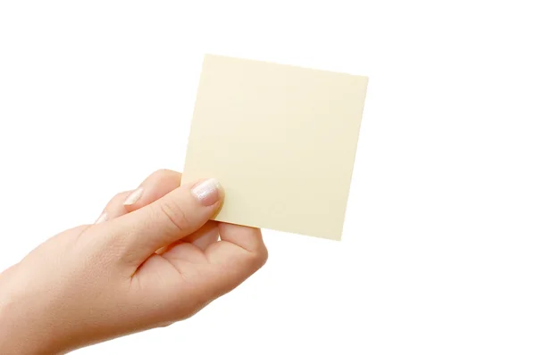 Weibliche Hand hält eine Karte isoliert — Stockfoto