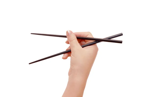 筷子在手上白色隔离 — 图库照片