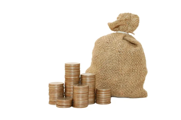 Moedas de dinheiro em saco isolado em branco — Fotografia de Stock