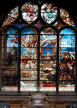 Stained-glass window in church clipart