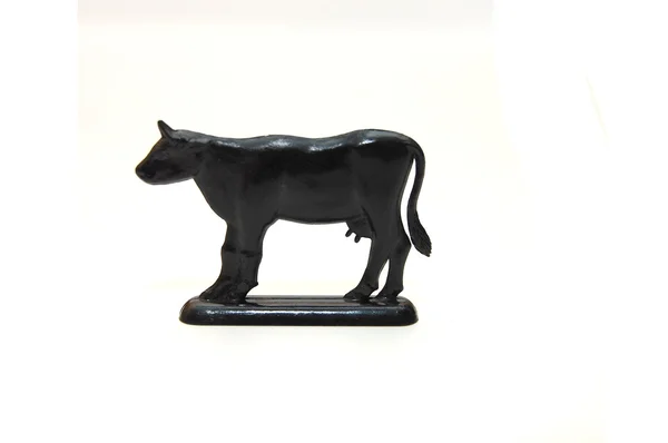 Speelgoed kunststof koe, geïsoleerd op wit — Stockfoto