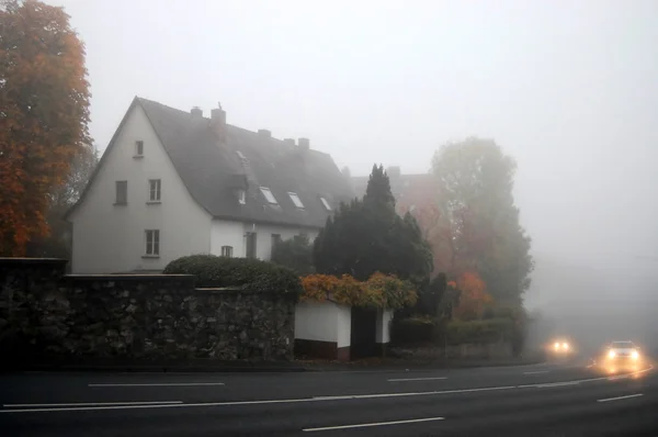 stock image Foggy morning on road to Germany