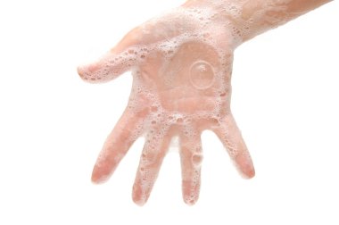 Female hand in soapsuds isolated on white clipart
