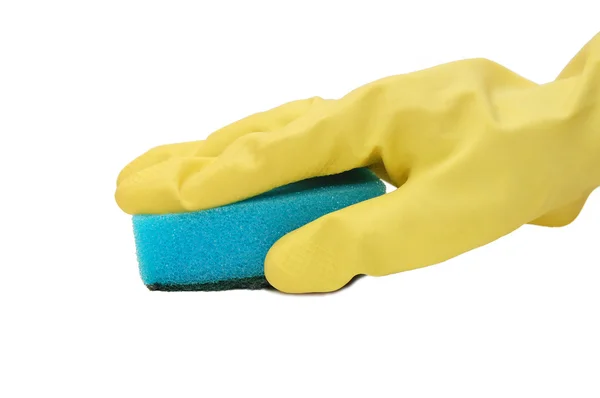 Рука в желтой перчатке с губкой — стоковое фото