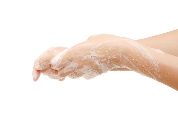 Mãos femininas em sabonetes isolados em branco — Fotografia de Stock