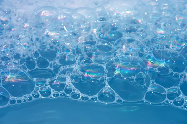 Blauw en wit water bubbels — Stockfoto