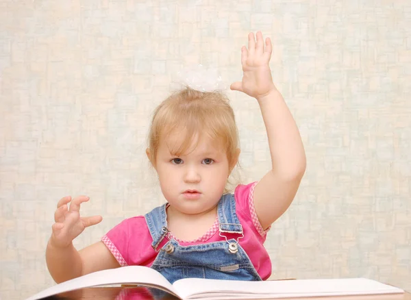 Small cute girl with hand up — Stock Photo, Image