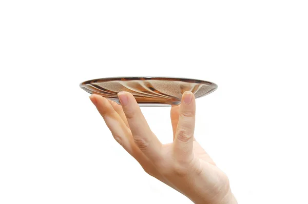 Leeg glas schotel in een vrouwelijke hand, geïsoleerde o — Stockfoto