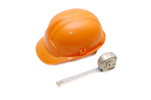 Oranžovou helmu a měřicí pásky — Stock fotografie
