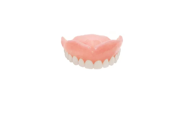 Protesi dentaria su sfondo bianco — Foto Stock