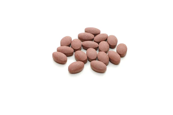 Pílulas de medicina natural isoladas em branco — Fotografia de Stock