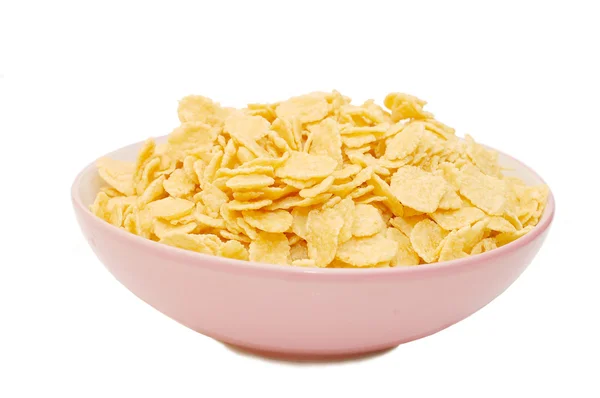 Flocos de milho em uma xícara com branco — Fotografia de Stock