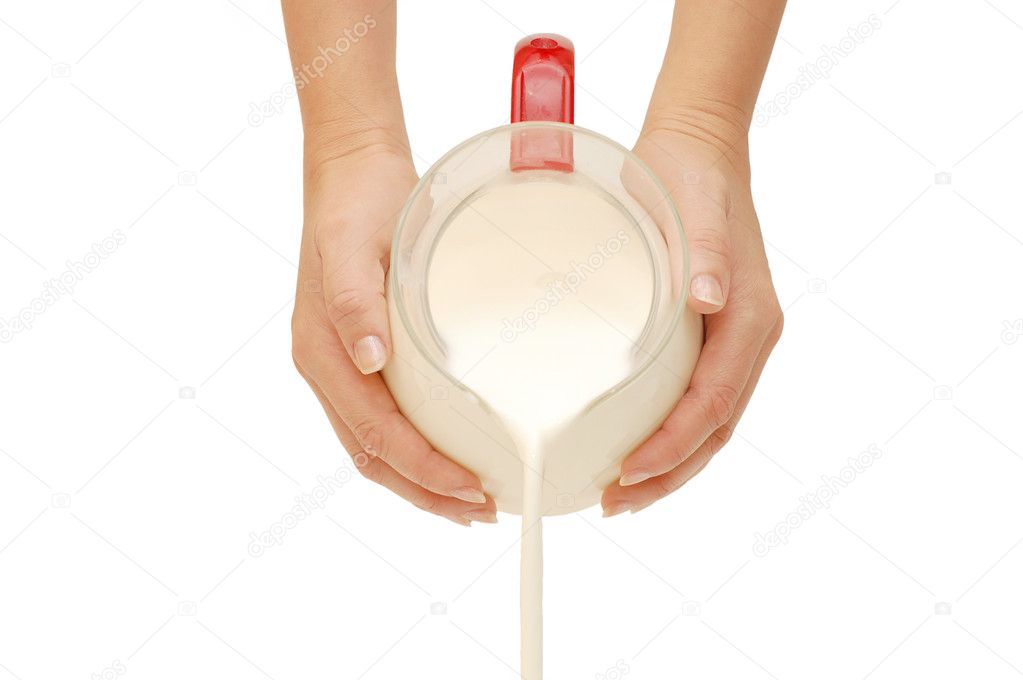 Pouring of milk from a jug