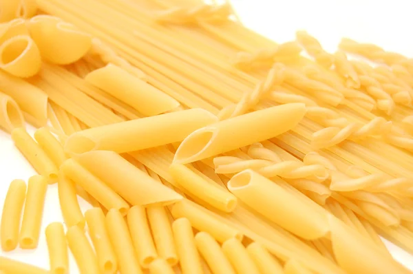 Various shapes of pasta background — Stock Photo, Image