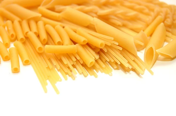 Olika former av pasta bakgrund — Stockfoto