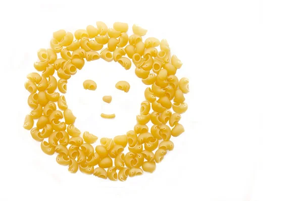 Symbol úsměv od makarony na bílém pozadí — Stock fotografie